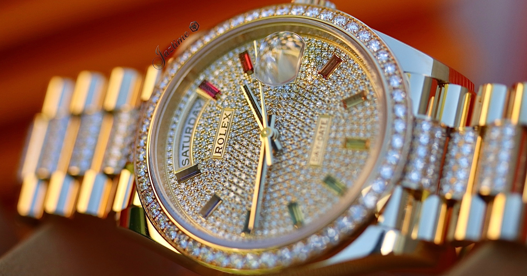 Close-up Rolex Day-Date 36 Yellow Gold Diamond Paved Rainbow Colored Sapphires Dial & Diamond Bezel Diamond Set President Bracelet 128348RBR-Jaztime Blog