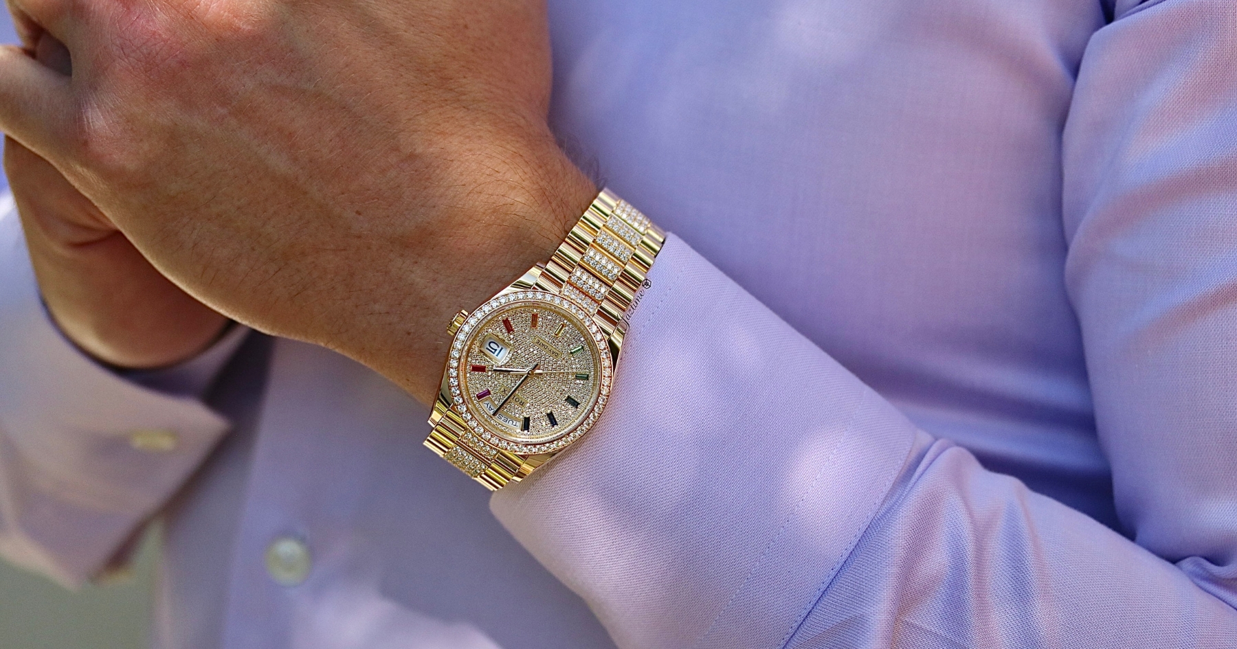 Rolex Day-Date 36 Yellow Gold Diamond Paved Rainbow Colored Sapphires Dial & Diamond Bezel Diamond Set President Bracelet 128348RBR-on-the-wrist-Jaztime Blog