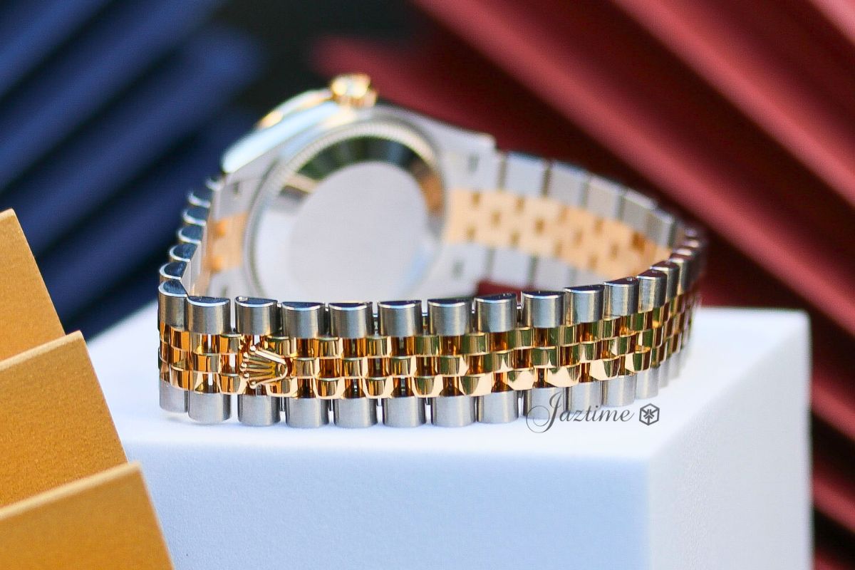 The bracelet of the Rolex Datejust 31 Yellow GoldSteel Olive Green Floral Motif Dial & Diamond Bezel Jubilee Bracelet 278383RBR - Jaztime Blog - New & Used Luxury Watches - Orange County - CA - Jaztime Blog