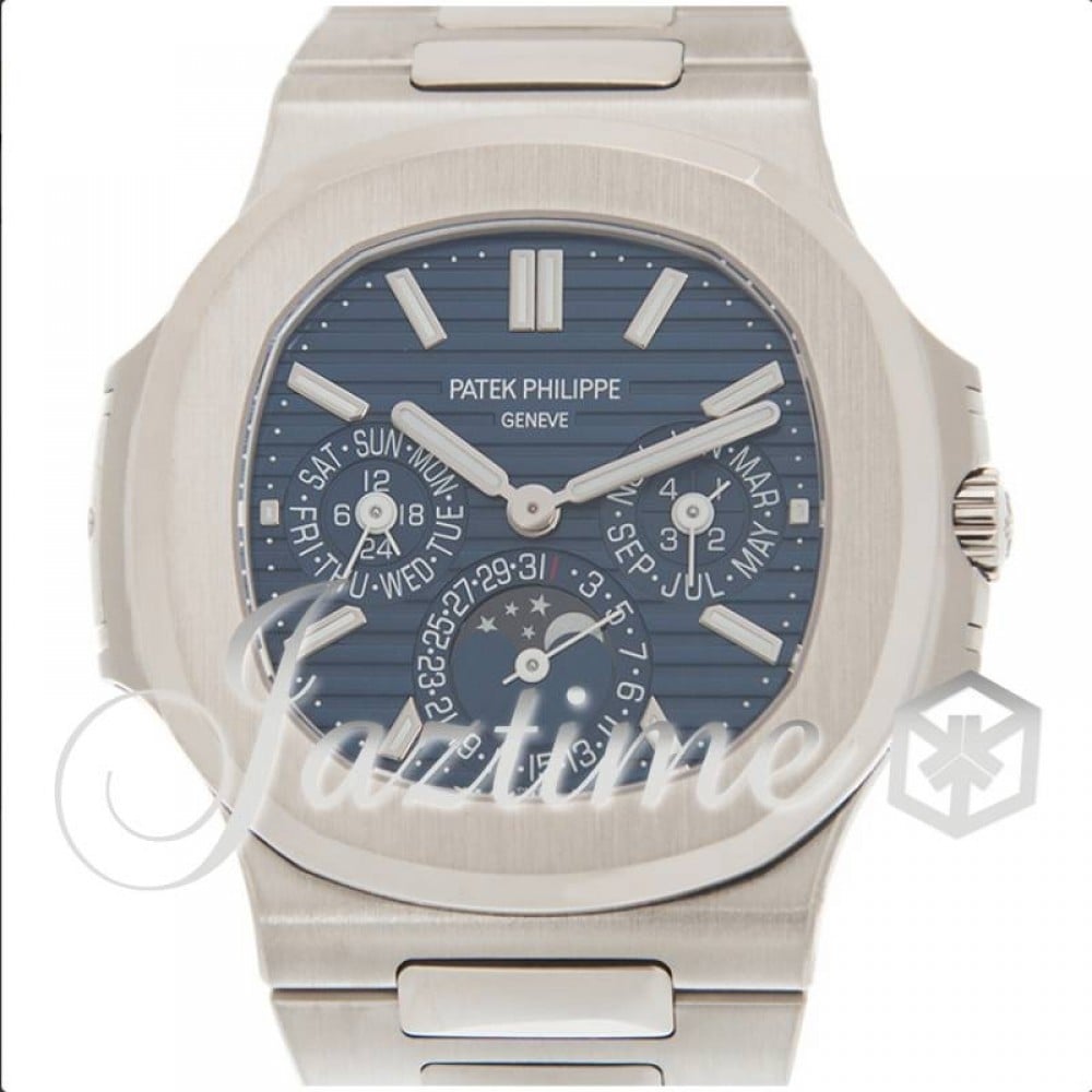 FACTORY SEALED PATEK PHILIPPE WHITE GOLD NAUTILUS WITH PERPETUAL