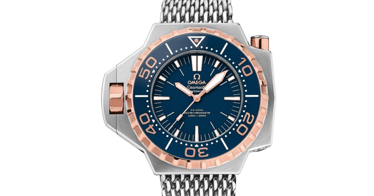 Omega Seamaster Ploprof 1200M Co Axial Master Chronometer 55x48mm Titanium Sedna Gold Blue Dial Titanium Bracelet 227.60.55.21.03.001 BRAND NEW