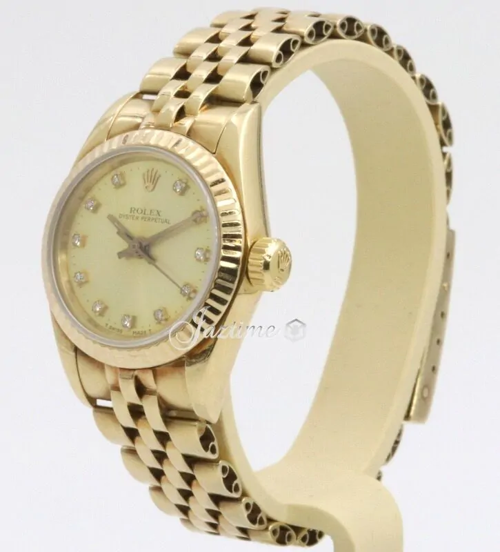 ❋1195❋ Rolex Oyster Perpetual Yellow Gold Champagne Diamond Dial